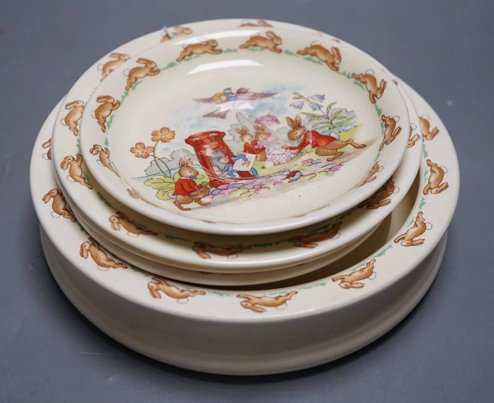 Royal Doulton Bunnykins: two dishes, 19 and 15cm, pair of side plates and a saucer